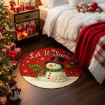 Round Christmas rug with snowman design and 'Let It Snow!' text in a bedroom setting.

