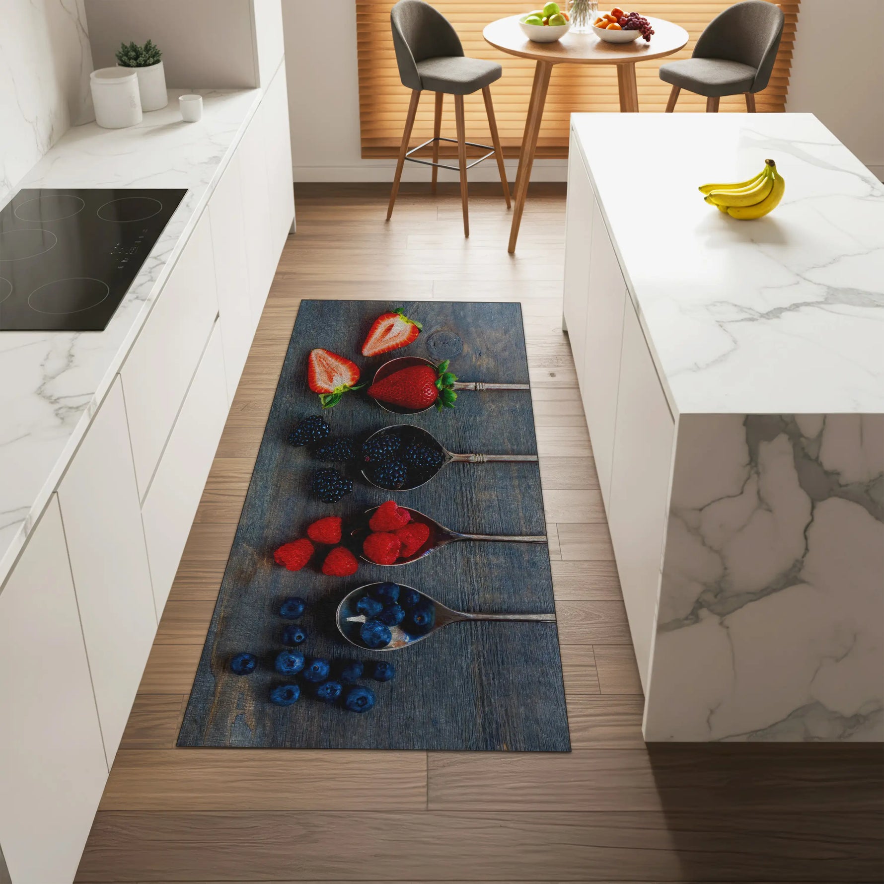 Kitchen with a decorative mat featuring strawberries and blueberries on a wooden floor.