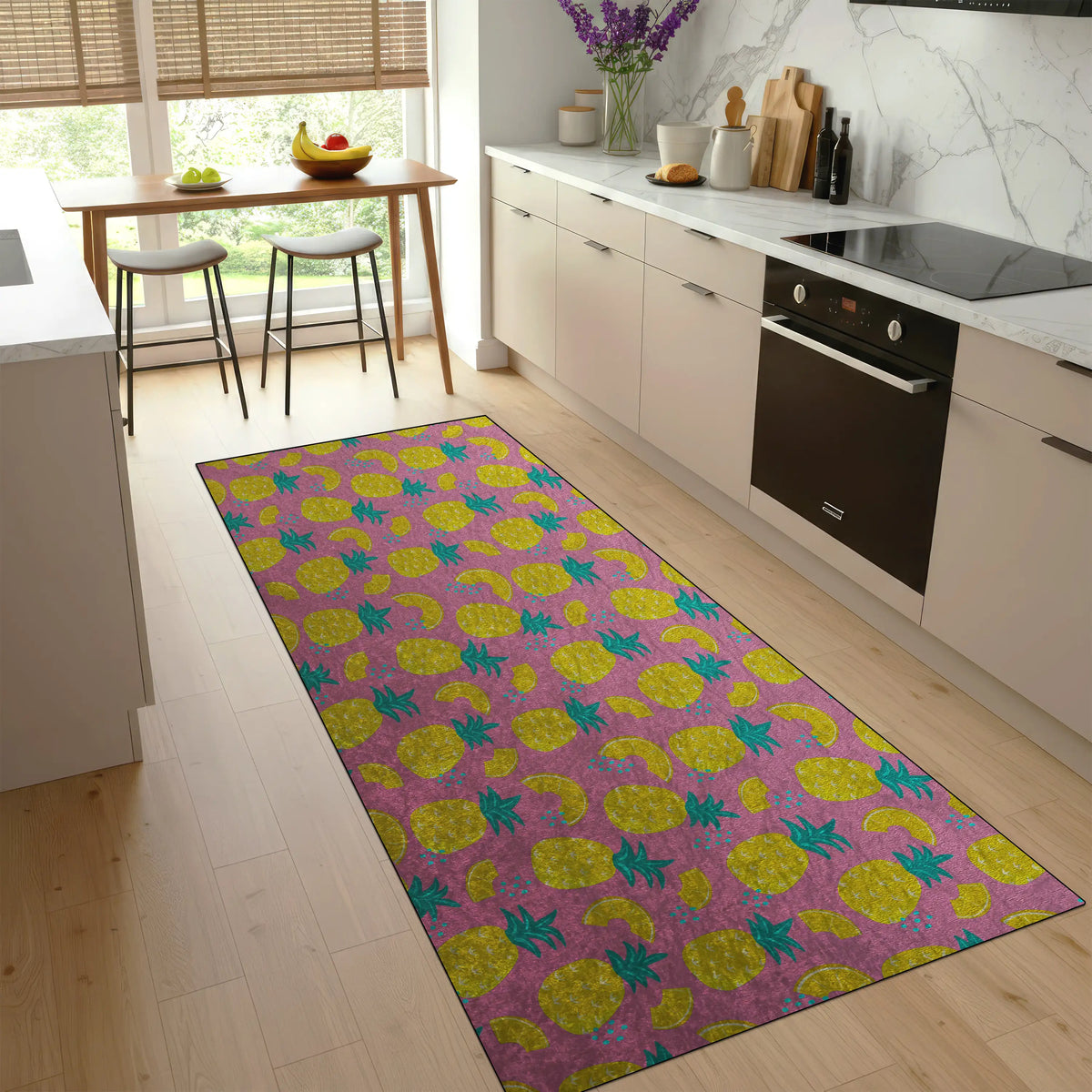 Colorful pineapple-patterned rug on a wooden floor in a modern kitchen.