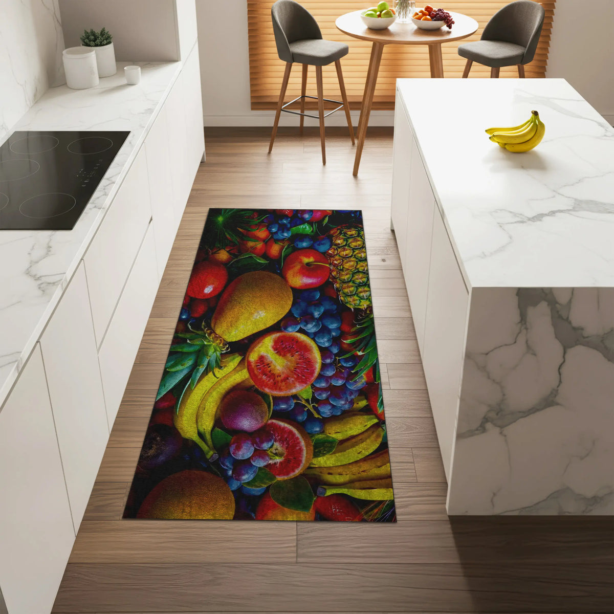 Bright fruit-print runner rug under kitchen island with bar stools