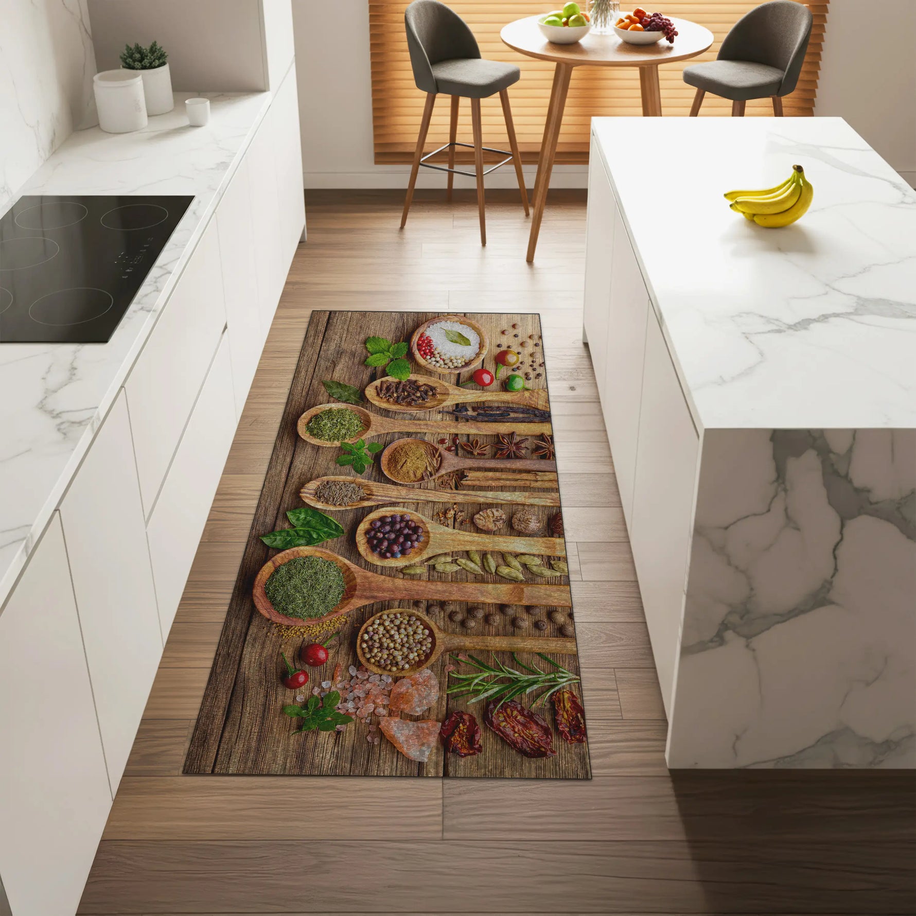 Kitchen floor with a decorative mat featuring wooden spoons and food items, leading to a kitchen island.
