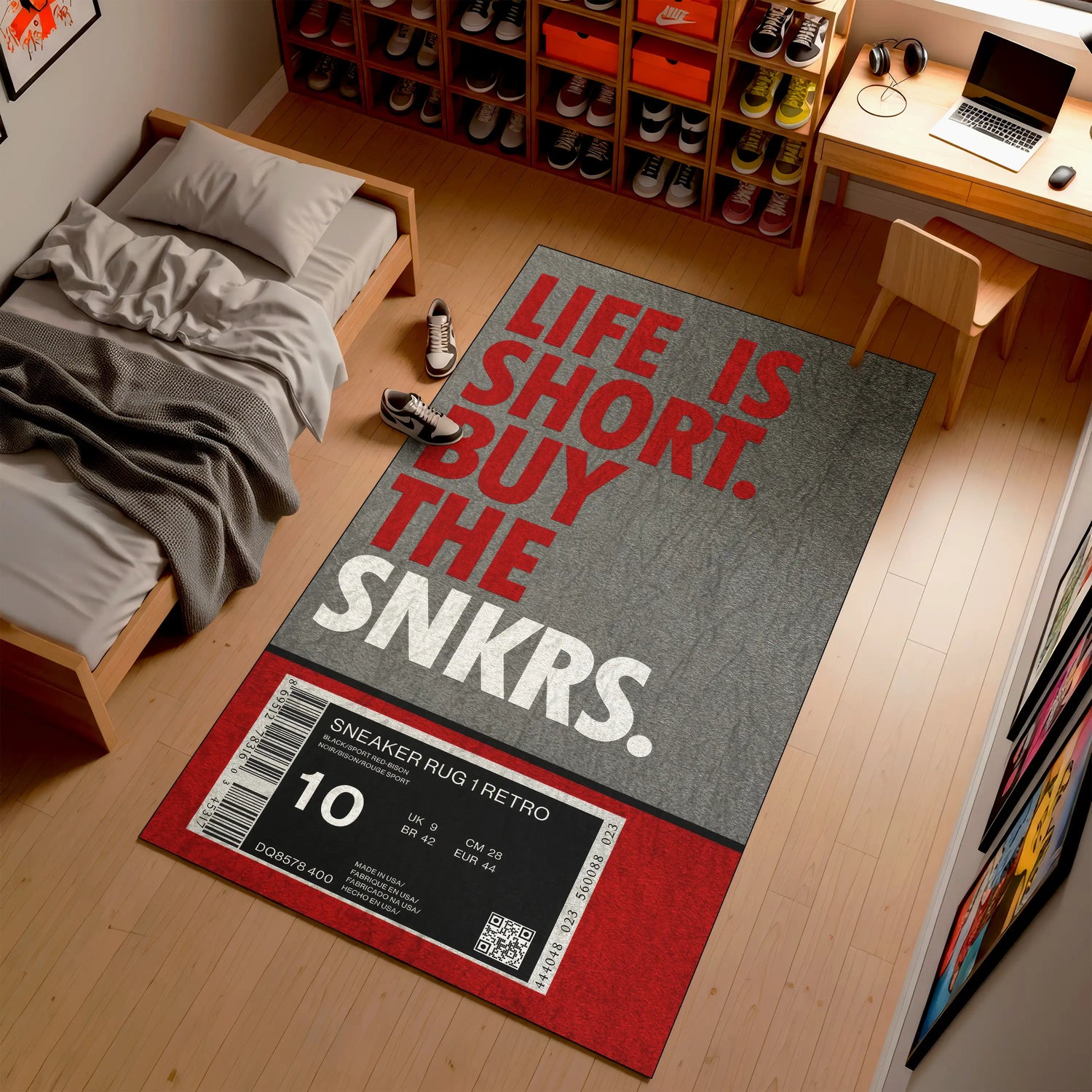 Sneaker-themed rug with 'Life is Short, Buy the Snkrs' text in a room with a bed and desk.

