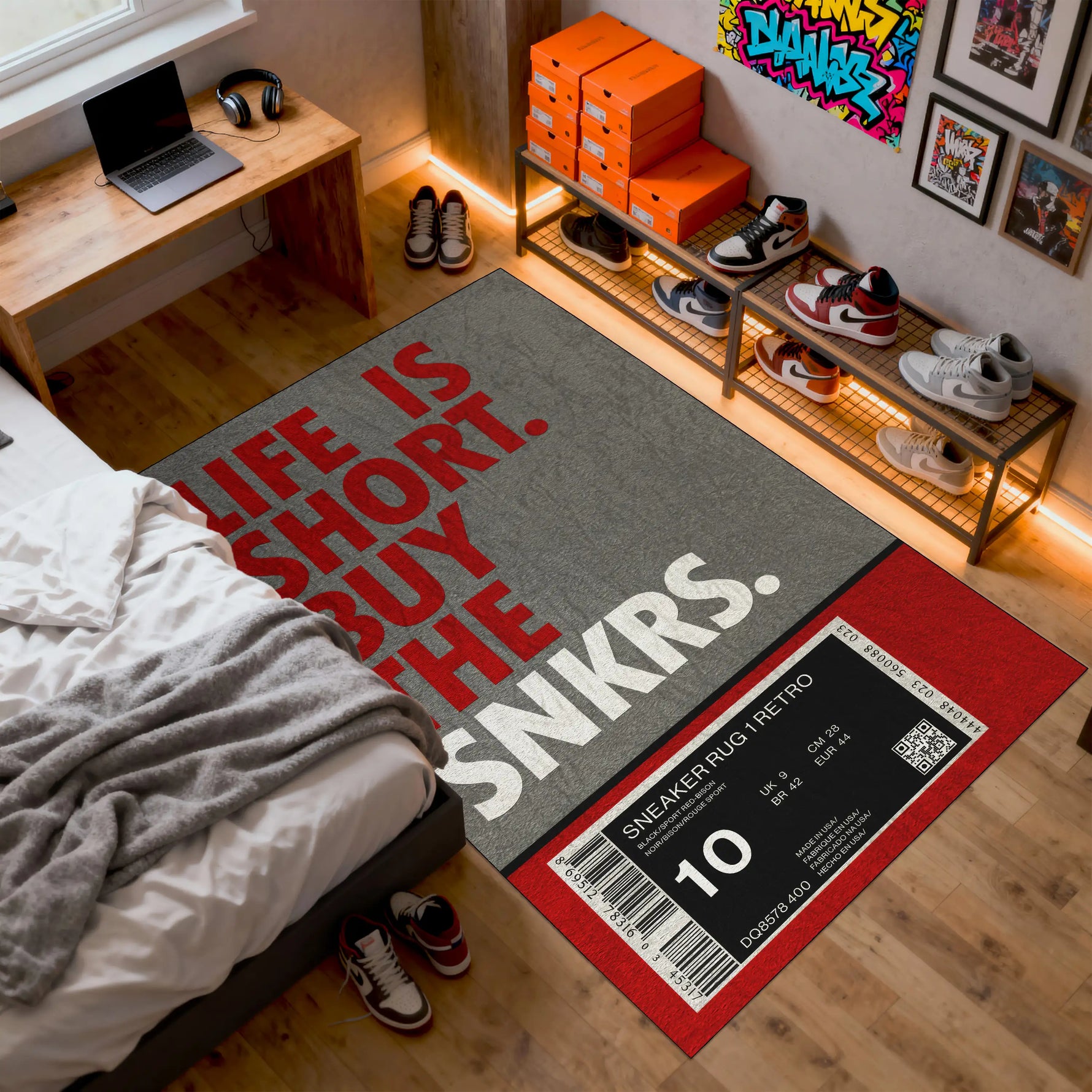 Room interior with a rug featuring a motivational quote and sneakerbox design.

