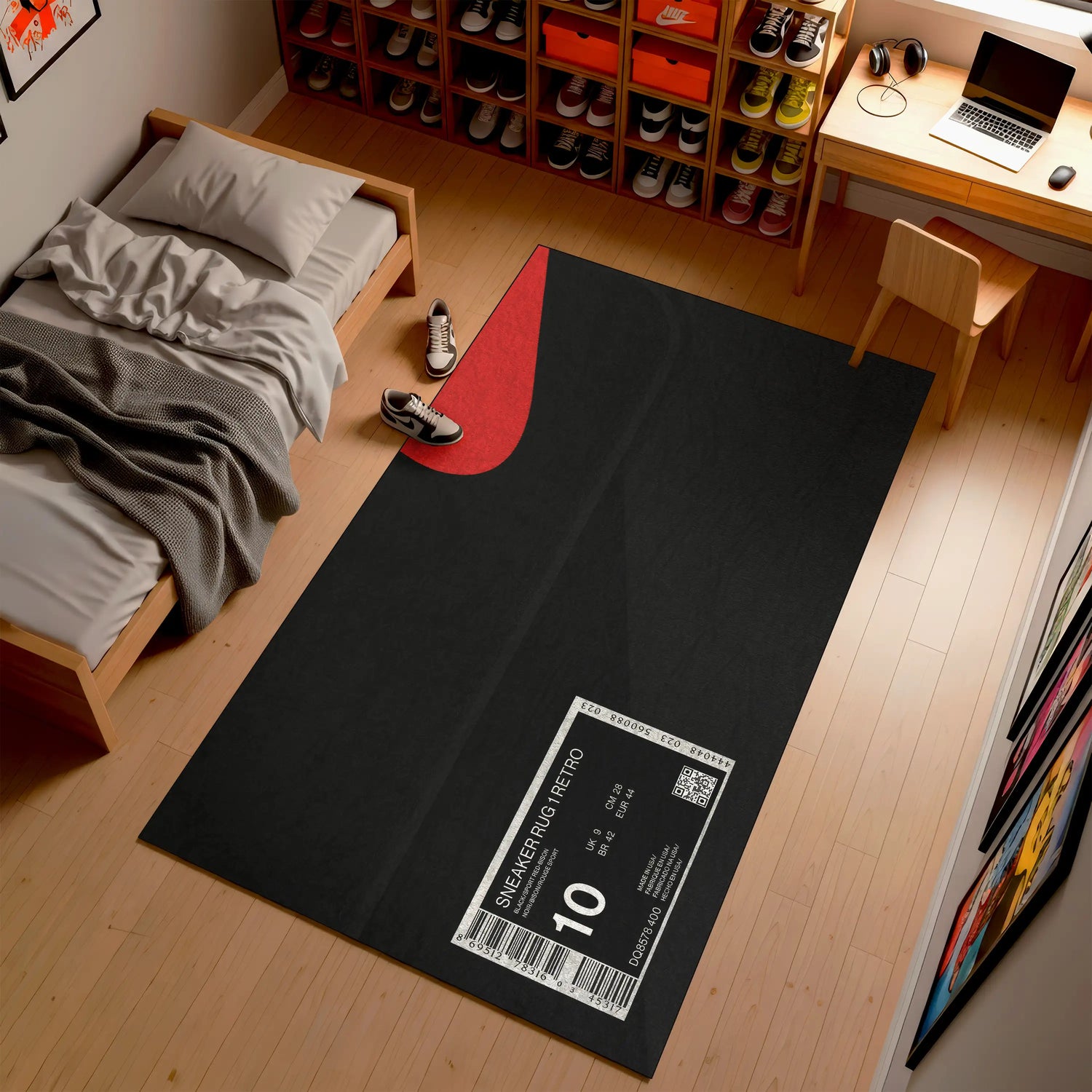 Black mat with sneaker return label on a wooden floor in a room with a bed and desk.

