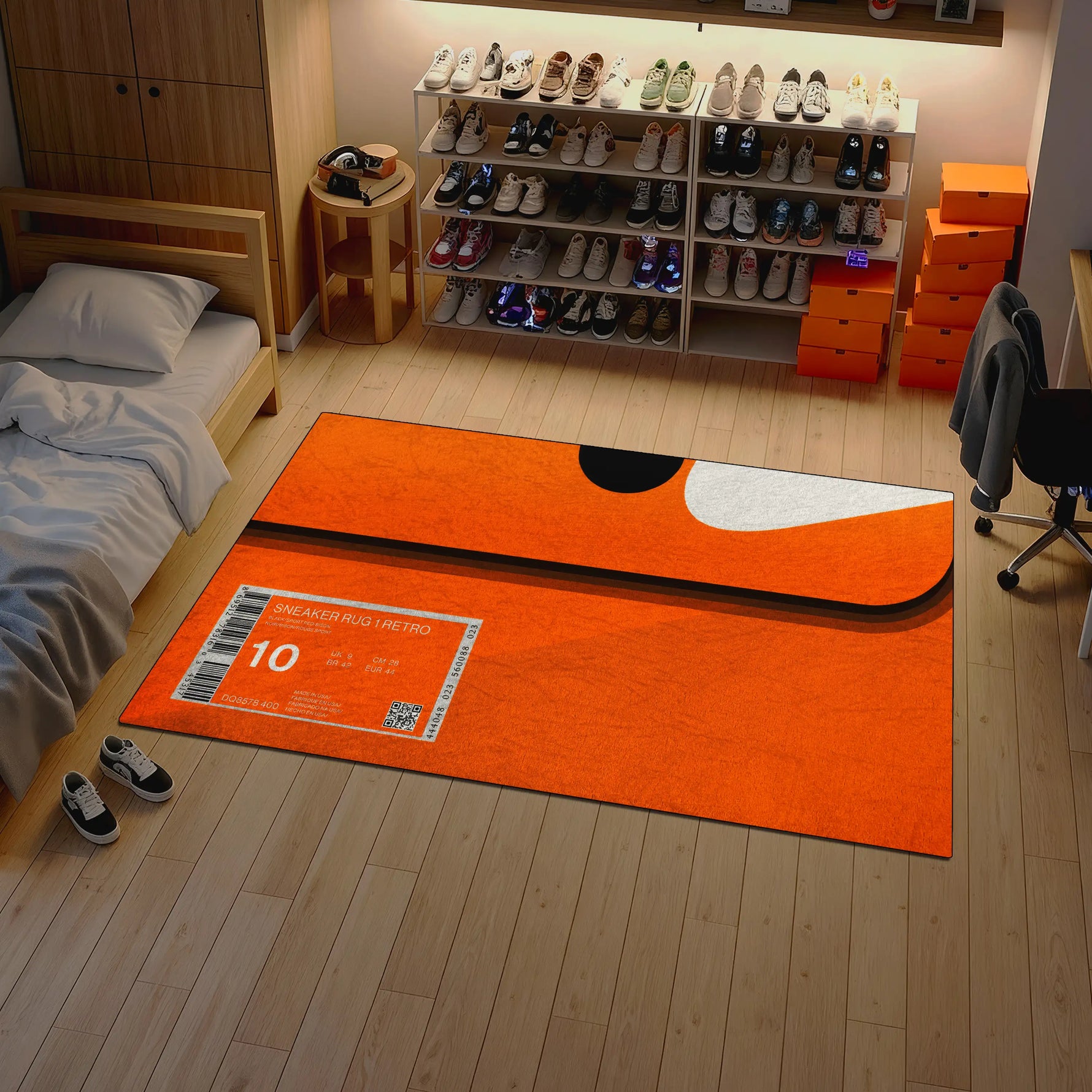 Orange rug with a design on a wooden floor in a room with shelves and furniture.

