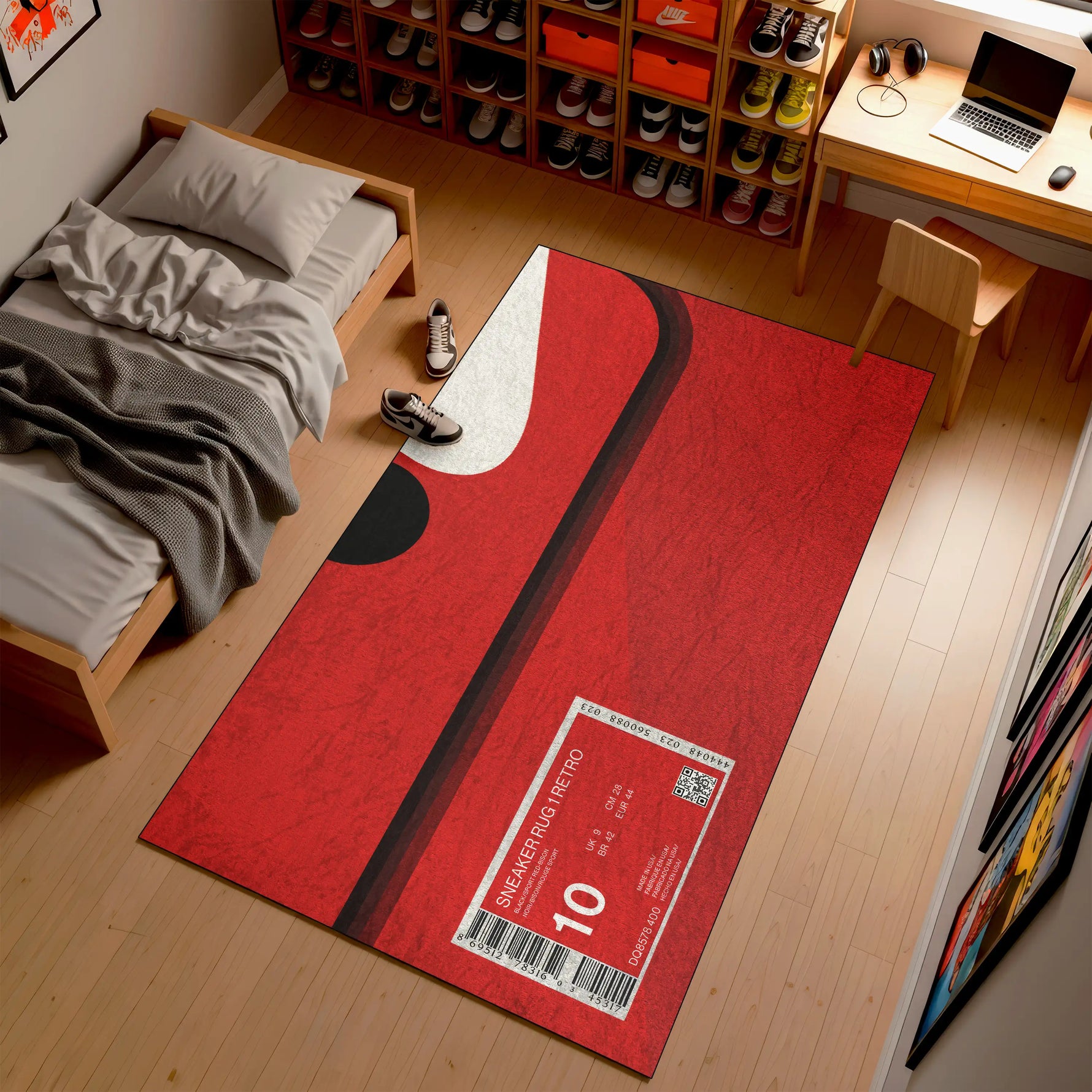 Red rug with sneaker design in a room with a bed, desk, and shoe rack.

