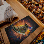 Colorful rug with a shoe design on a wooden floor next to a bed.
