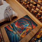 Colorful rug with a dragon design on a wooden floor next to a bed.

