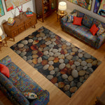 Living room with patterned rug, colorful couches, and decorative items.