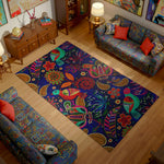 Living room with a colorful patterned rug and furniture.