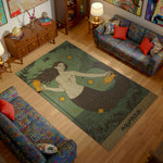Living room with a mermaid-themed rug labeled 'Aquarius' on a wooden floor.
