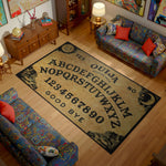Living room with a Ouija board rug on wooden floor