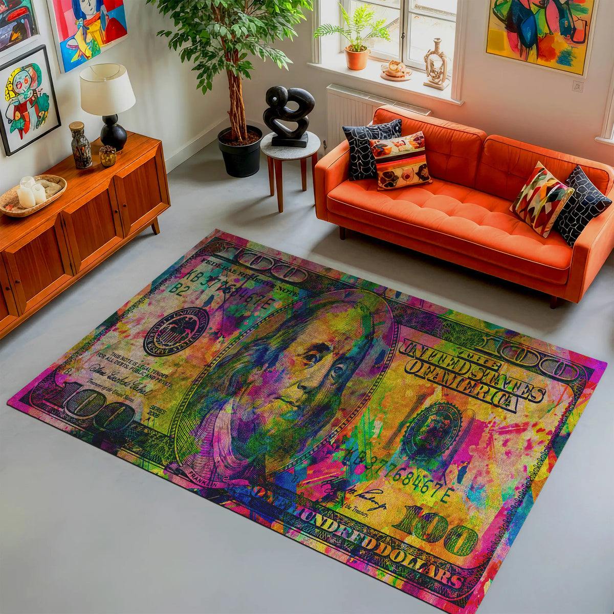Living room with a colorful rug featuring a dollar bill design, orange sofa, and decorative items.

