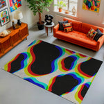 Living room with a colorful abstract rug, orange sofa, and decorative items.