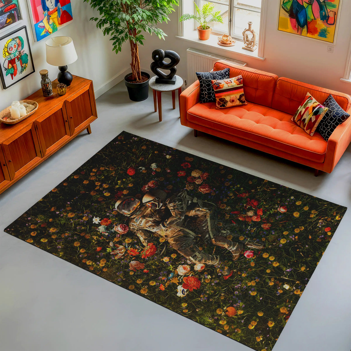 Living room with an orange sofa, decorative rug featuring a cat and flowers, and various decor items.