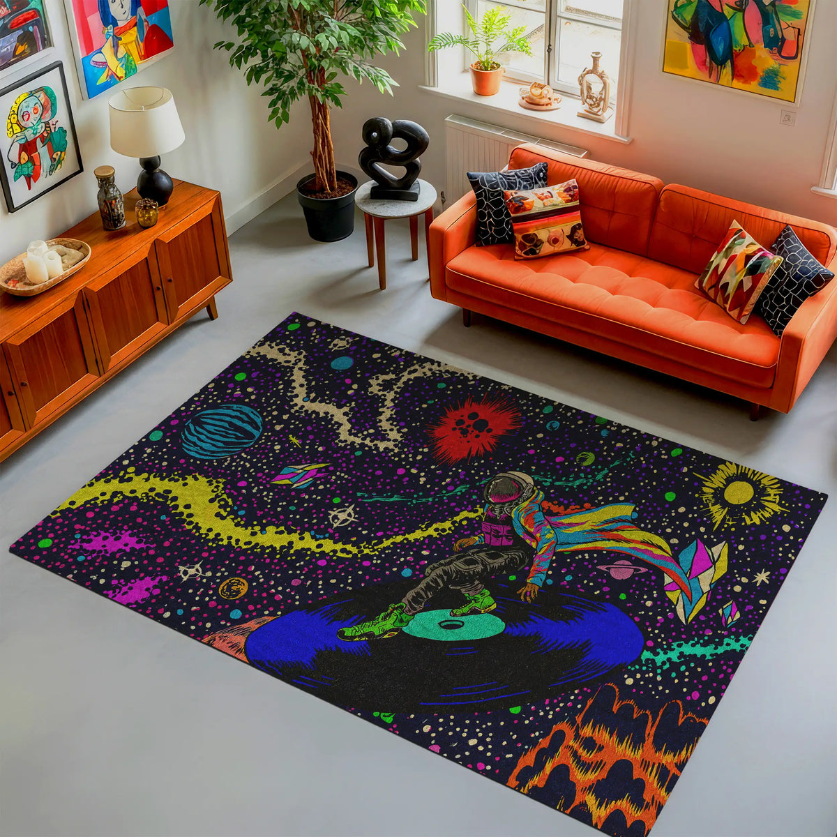 Colorful abstract rug on a gray floor with an orange couch and decorative items in the background.