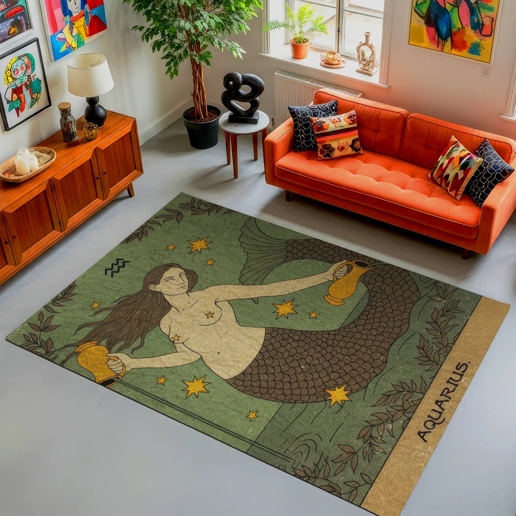 Living room with an orange sofa, decorative rug featuring a mermaid design, and various decor items.