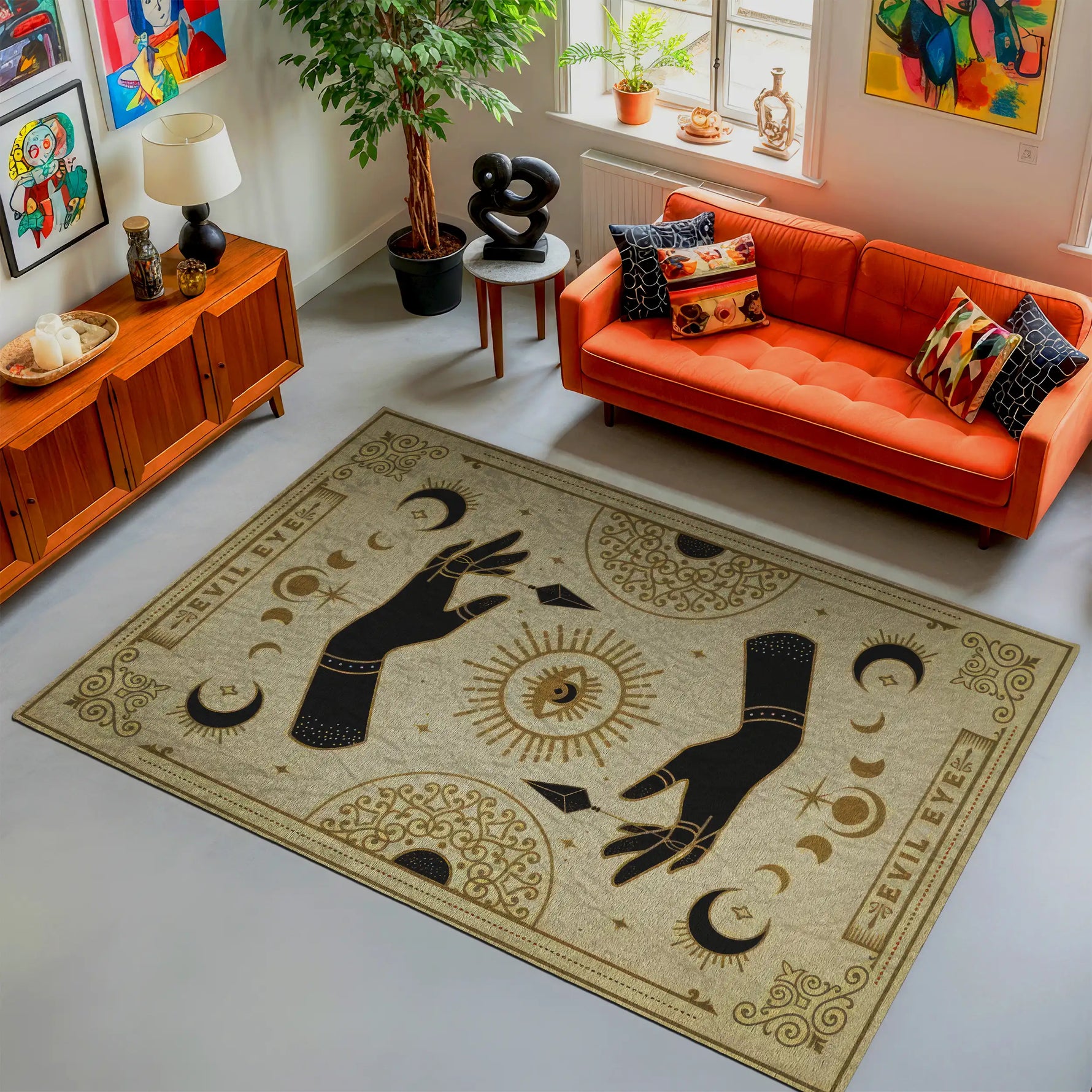 Decorative rug with black hand design and celestial symbols in a living room.