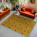 Living room with a colorful floral rug, orange sofa, and decorative items.