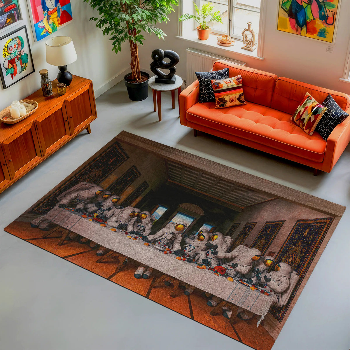 Living room with an orange sofa, decorative pillows, and a large rug featuring a dog painting.