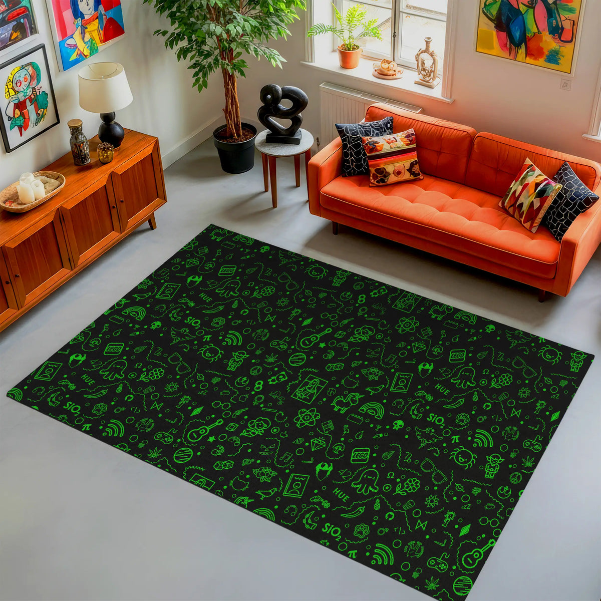 Living room with a green patterned rug, orange sofa, and decorative items.