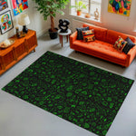 Living room with a green patterned rug, orange sofa, and decorative items.