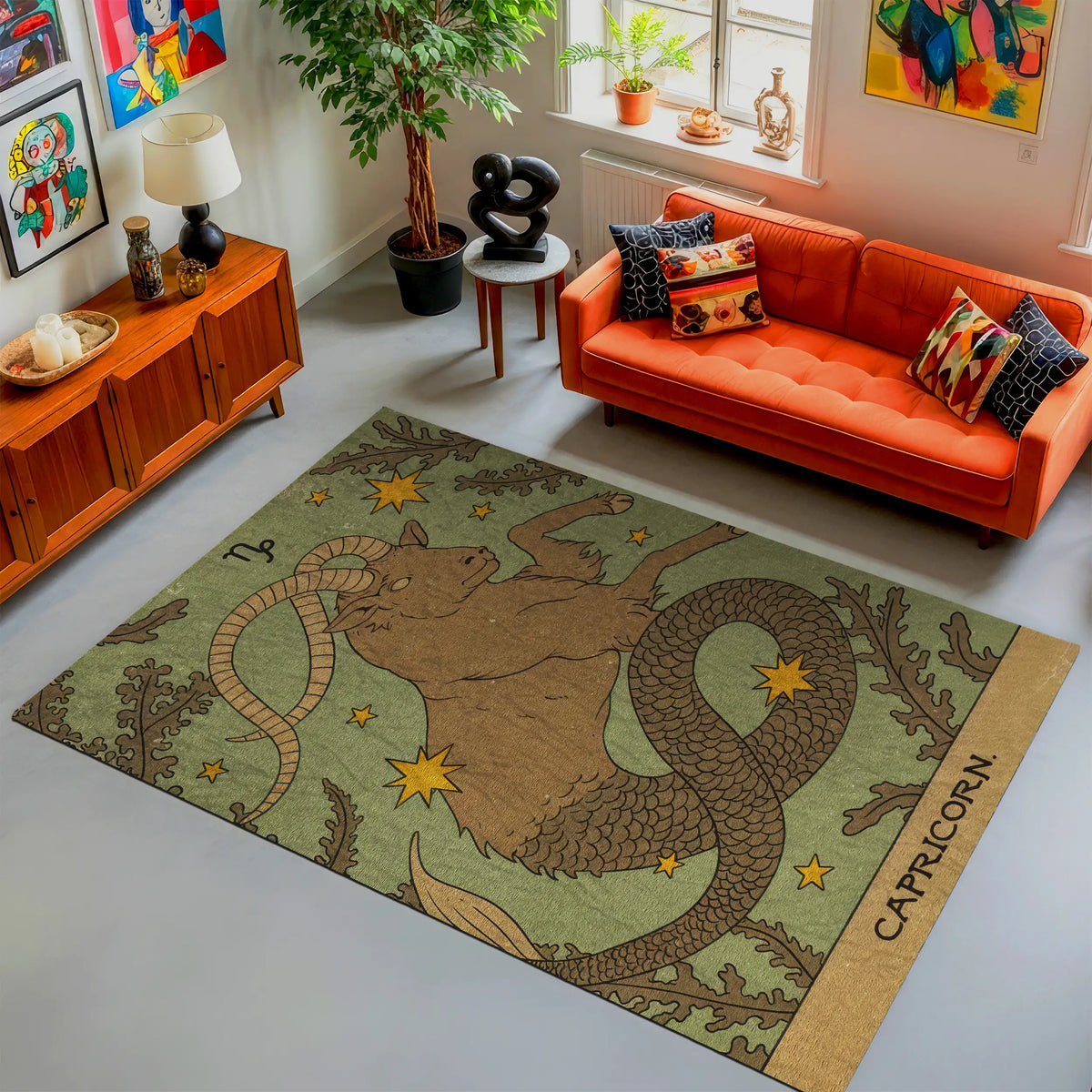 Living room with an orange sofa, decorative rug featuring a capricorn design, and various decor items.