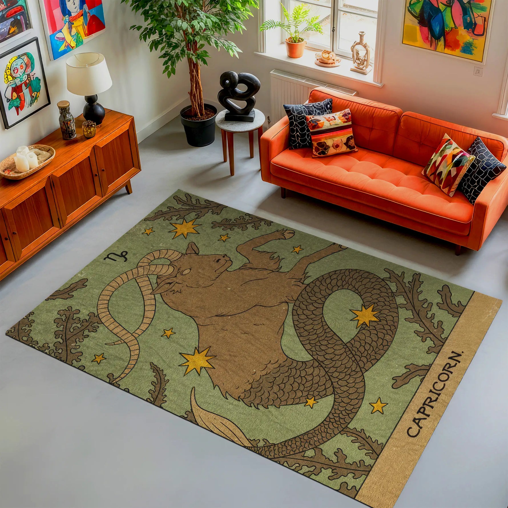 Living room with an orange sofa, decorative rug featuring a capricorn design, and various decor items.