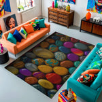 Colorful living room with an orange sofa, turquoise chair, and a stone-patterned rug.