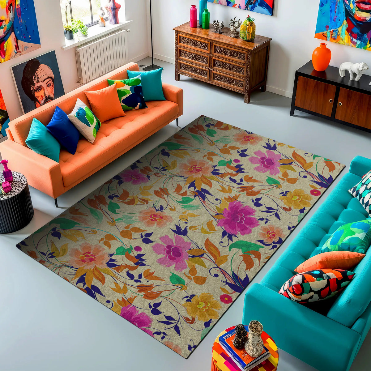 Colorful living room with orange and blue sofas, a floral rug, and decorative items.
