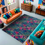 Colorful living room with orange and teal sofas, patterned rug, and decorative items.