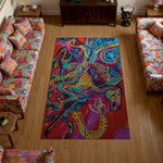 Colorful abstract rug on a wooden floor with patterned chairs.
