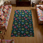 Colorful floral-patterned rug in a living room with patterned furniture.