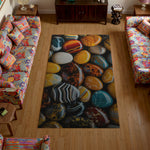 Living room with colorful floral-patterned sofa and a rug featuring multicolored stones.