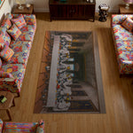 Living room with colorful furniture and a decorative rug featuring a castle design.