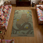 Living room with a Capricorn-themed rug on a wooden floor