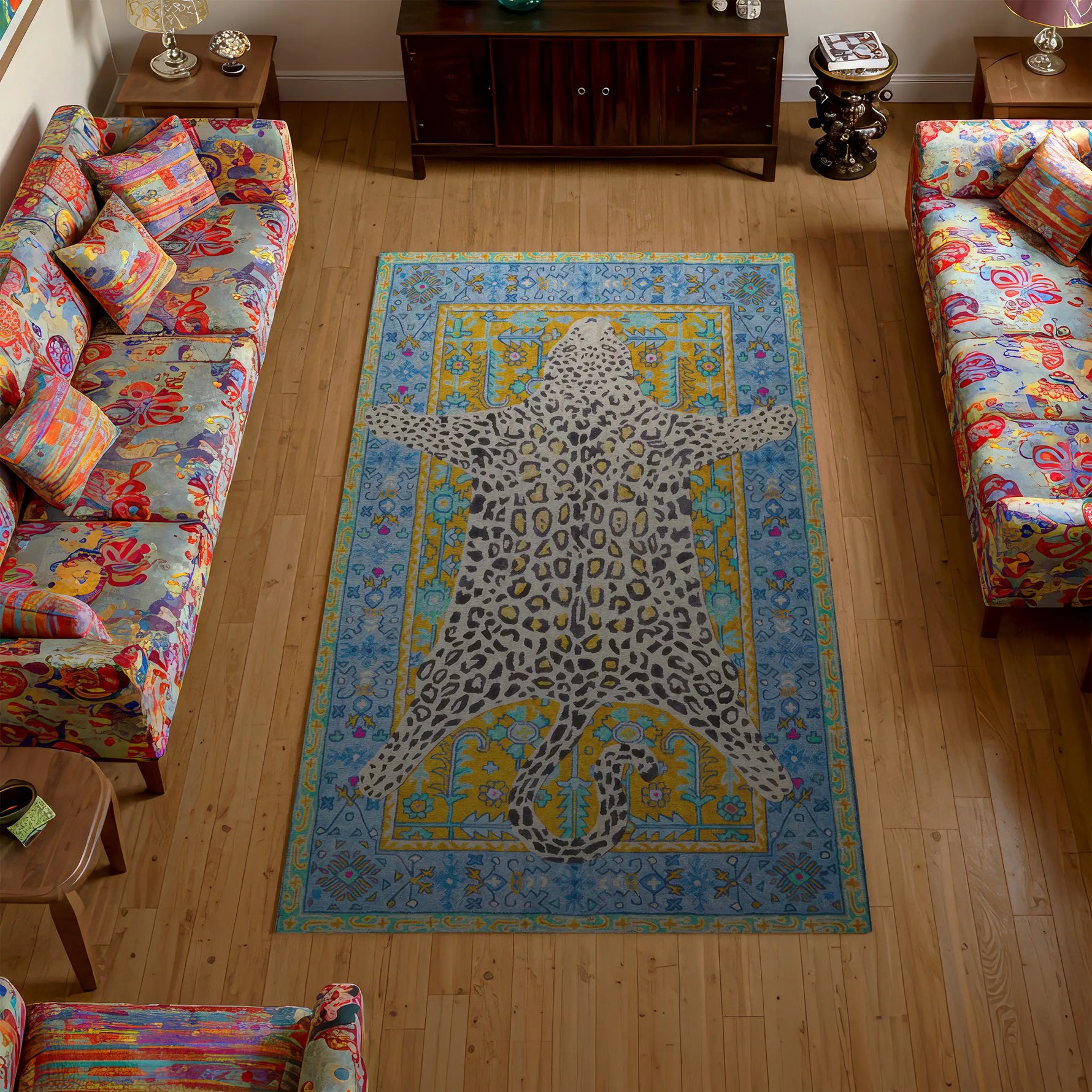 Colorful rug with a leopard design in a living room with patterned chairs.