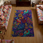 Colorful patterned rug in a living room with floral and abstract designs.