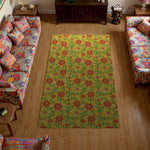 Living room with a colorful floral-patterned rug on wooden flooring